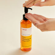 ProtoClinical k-beauty warm beige beauty product detail with pale blue sides on a light background.