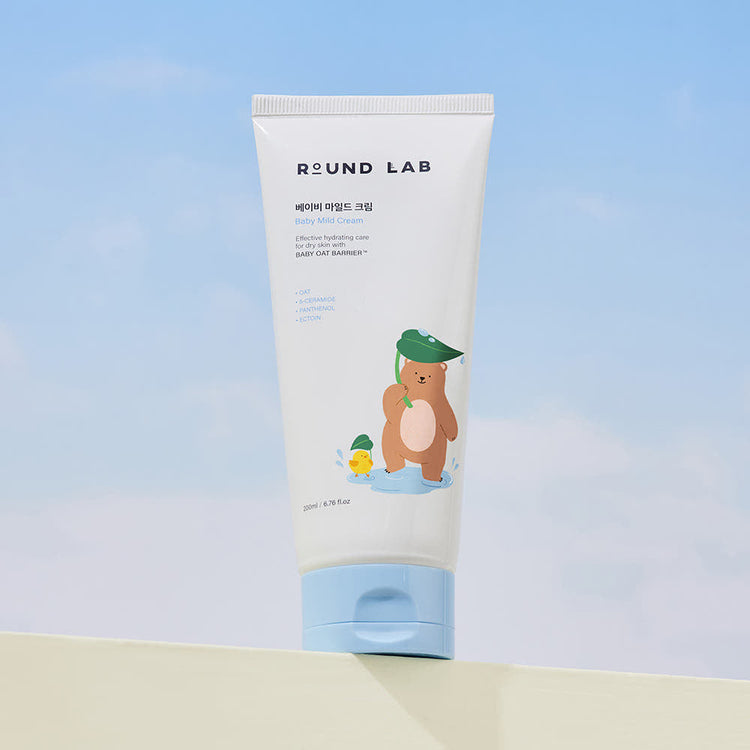 ProtoClinical k-beauty abstract beauty graphic with a pale blue upper half and warm taupe lower half.