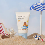 ProtoClinical k-beauty Round Lab Baby Mild Sun Cream SPF 50+ PA++++ 60ml single upright pale green sun cream tube centered on a white background with soft blue lower corners.