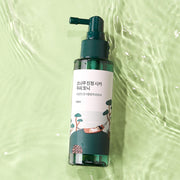 ProtoClinical k-beauty soft green beauty product silhouette on a pale yellow background.
