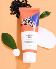 ProtoClinical k-beauty Round Lab Soybean Panthenol Cleanser 150ml single upright pink cleanser tube on a light background with soft blue side accents.