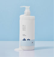ProtoClinical k-beauty abstract beauty graphic with a pale blue field on a light background.