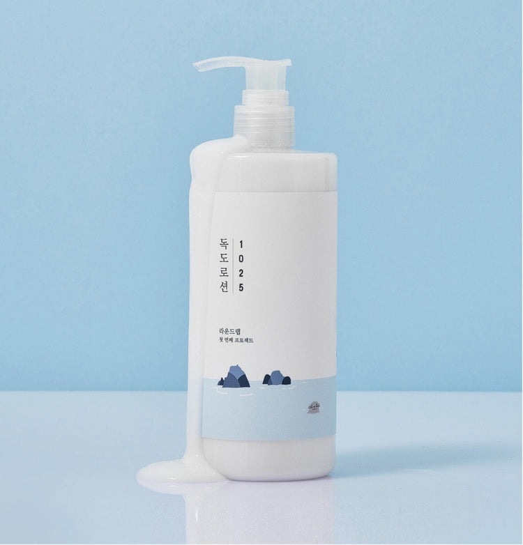ProtoClinical k-beauty abstract beauty graphic with a pale blue field on a light background.
