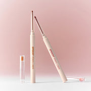 ProtoClinical k-beauty peripera Speedy Pencil Liner 0.14g single slim pencil liner standing upright on a soft beige and pink background