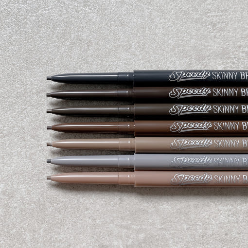 ProtoClinical k-beauty PERIPERA Speedy Skinny Brow 0.05g (#8~#10) single dark brow pencil standing upright on a light neutral background