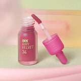 ProtoClinical k-beauty [PERIPERA] Ink Airy Velvet (AD) 4g (#7,#8,#31~#35) shown in a coral-red shade detail graphic with rectangular color swatches, dark tint shapes, and pale green corner accents