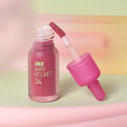ProtoClinical k-beauty [PERIPERA] Ink Airy Velvet (AD) 4g (#7,#8,#31~#35) shown in a coral-red shade detail graphic with rectangular color swatches, dark tint shapes, and pale green corner accents