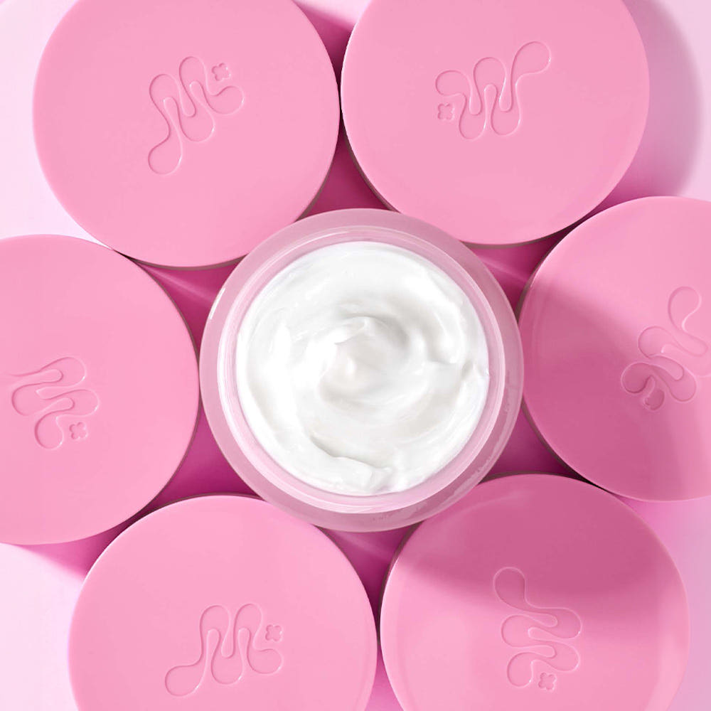 ProtoClinical k-beauty pink beauty visual with a soft white center on a light background.