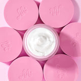 ProtoClinical k-beauty pink beauty visual with a soft white center on a light background.