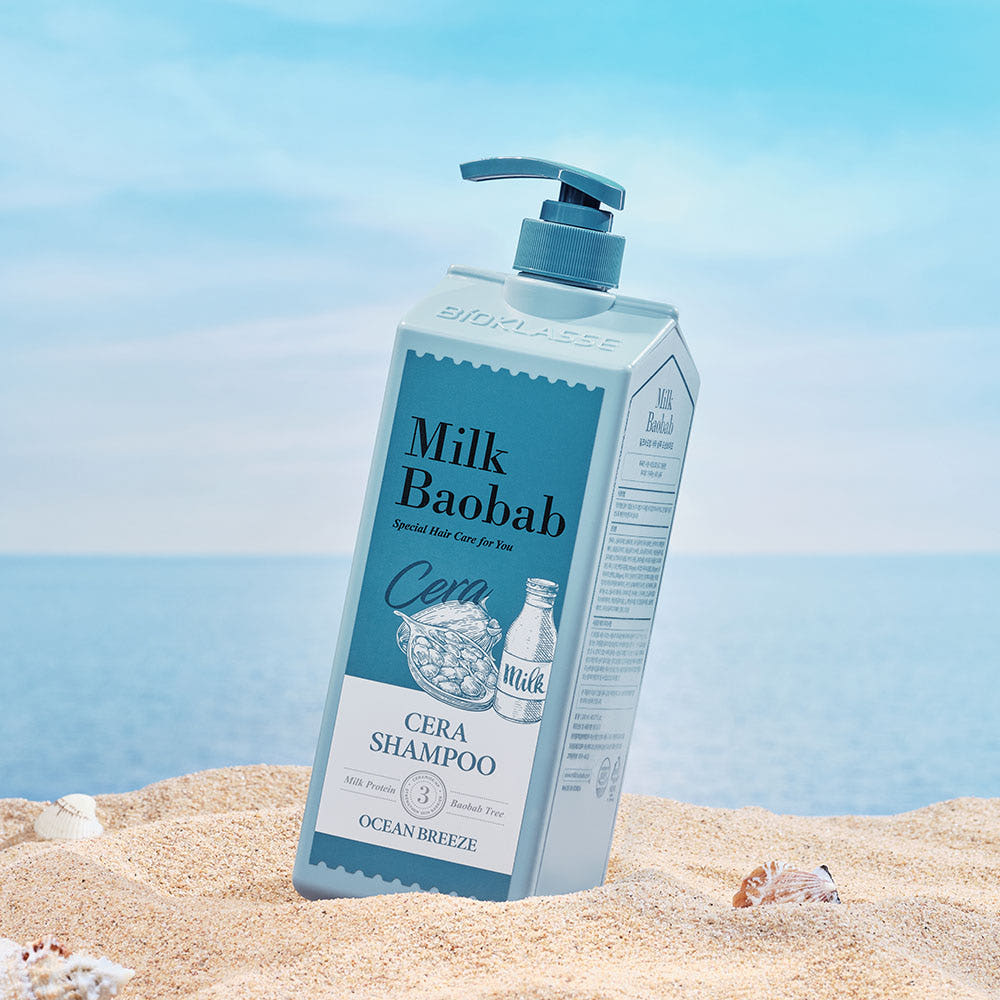 ProtoClinical k-beauty BIOKLASSE MILK BAOBAB CERA Hair Shampoo 1200ml #Ocean Breeze single upright shampoo bottle on a white background.