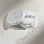 ProtoClinical k-beauty rom&nd Back Me No Sebum Powder 5g shown as a single pale gray powder package centered on a light background