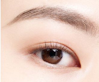 ProtoClinical k-beauty BANILA CO Smudge Out Detail Browcara 4g single slim brown browcara tube centered on a pale beige background with soft side shading