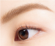 ProtoClinical k-beauty BANILA CO Smudge Out Detail Browcara 4g single slim brown browcara tube centered on a pale beige background with soft side shading