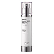 ProtoClinical k-beauty IOPE Bright Dark Spot Essence 45ml slim lavender-gray essence bottle on a pale background