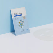 ProtoClinical k-beauty SKINFOOD Blue Chamomile Hyaluronic Mask Sheet 25g X 10ea single pale blue rectangular mask packet with a peach-toned upper panel centered on a light background