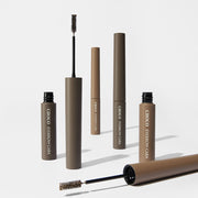 ProtoClinical k-beauty SKINFOOD Choco Eyebrow Cara 4g single eyebrow mascara tube standing vertically on a soft beige background
