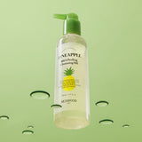 ProtoClinical k-beauty SKINFOOD Pineapple BHA Peeling Cleansing Oil 200ml single cleansing oil bottle in a square studio packshot on a light background with visible front label details