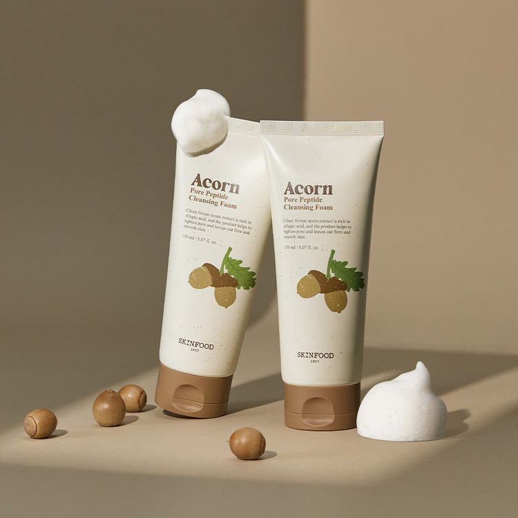 ProtoClinical k-beauty SKINFOOD Acorn Pore Peptide Cleansing Foam 150ml single beige cleanser tube standing upright on a clean white background