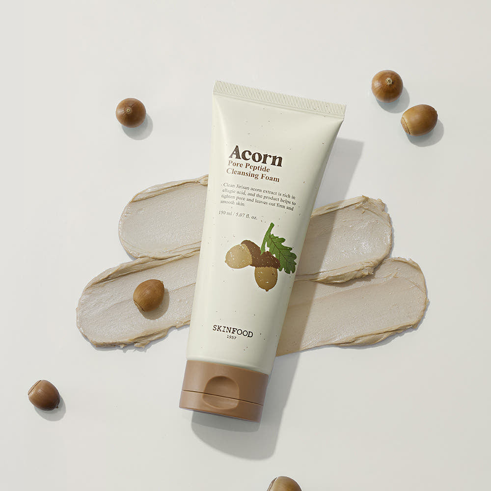 ProtoClinical k-beauty SKINFOOD Acorn Pore Peptide Cleansing Foam 150ml single beige cleanser tube standing upright on a clean white background