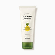 ProtoClinical k-beauty SKINFOOD Pineapple BHA Peeling Cleansing Foam 150ml single pale yellow cleanser tube in a close view on a white background with visible front label details