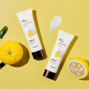 ProtoClinical k-beauty SKINFOOD Yuja C Tone Up Cream SPF50+ PA++++ 50ml single upright yellow tone-up cream package centered on a bright yellow background.