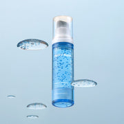 ProtoClinical k-beauty Dr.G Hydra Aqua Capsule Essence 50ml shown as a pale blue product silhouette centered on a cool gray background.