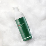 ProtoClinical k-beauty dark green beauty product silhouette on a pale gray background.