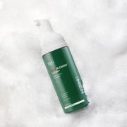 ProtoClinical k-beauty dark green beauty product silhouette on a pale gray background.