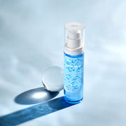 ProtoClinical k-beauty Dr.G Hydra Aqua Capsule Essence 50ml shown as a soft blue product close-up with a darker blue base on a cool gray background.