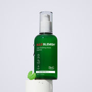 ProtoClinical k-beauty Dr.G RED BLEMISH Clear Soothing Active Essence 80ml shown as a deep green bottle silhouette centered between soft lavender side accents on a light background.