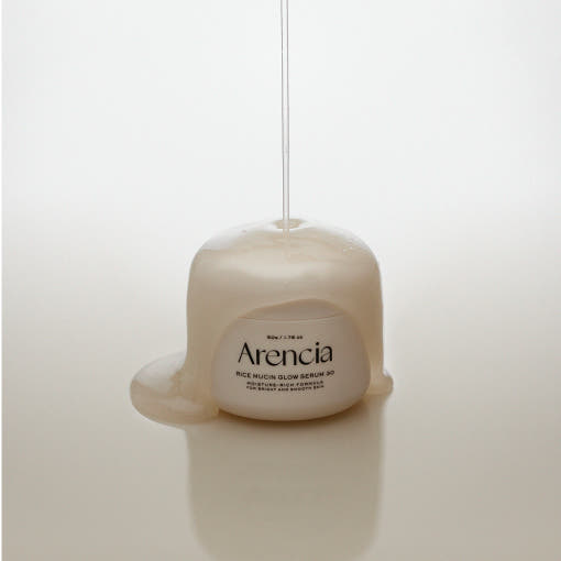 Arencia Rice Mucin Glow Serum 30 50g by ProtoClinical shown in a detailed skincare product layout on a clean background, highlighting the serum packaging for a k-beauty routine.
