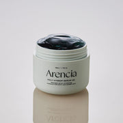 ProtoClinical k-beauty Arencia Holy Hyssop Serum 30 50g single upright olive gray serum bottle centered on a pale gray background with soft lavender side shading