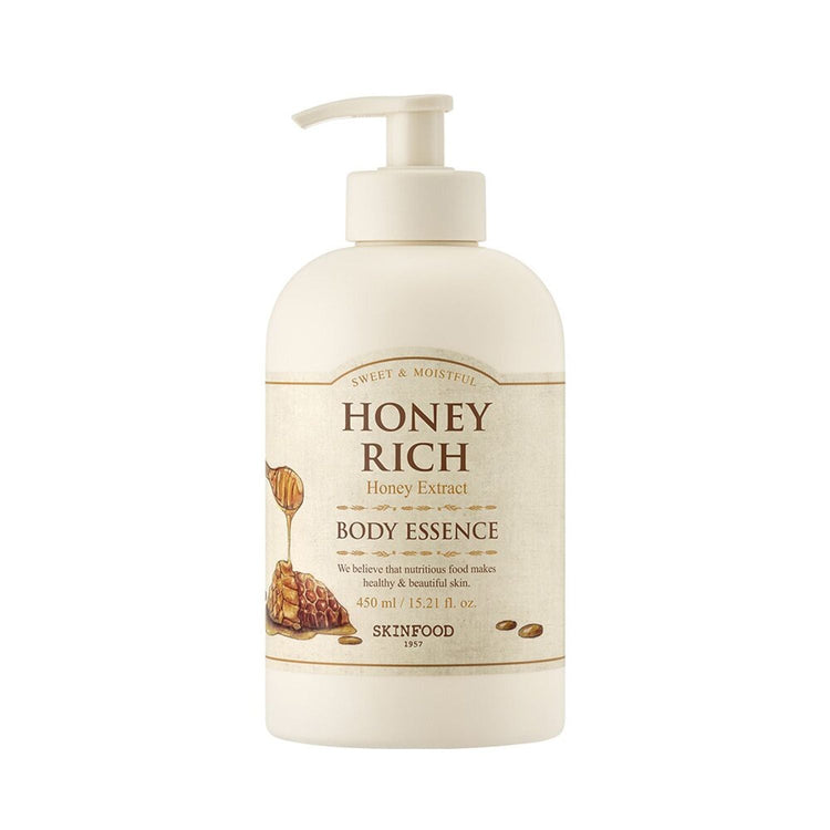 ProtoClinical k-beauty SKINFOOD Honey Rich Body Essence 450ml shown as a tall blush-beige package centered upright with pale blue side shading on a white background