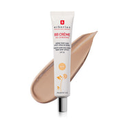 ProtoClinical k-beauty soft taupe and peach beauty graphic with pale blue lower corners on a light background.