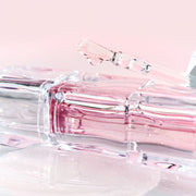 ProtoClinical k-beauty TIRTIR WATERISM Lip Plumper 3.3g square lip plumper detail graphic with peach and pale green panels across a light layout