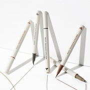 ProtoClinical k-beauty TONYMOLY Eye Tone Multi Technics Eyeliner 0.6g (5 Colors) single slim eyeliner pencil angled diagonally on a pale beige background