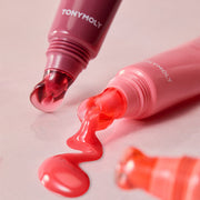 ProtoClinical k-beauty TONYMOLY Juicy Peptide Lip Jelly 10g (5 Colors) single upright lip jelly tube in a rosy pink tone on a peach background