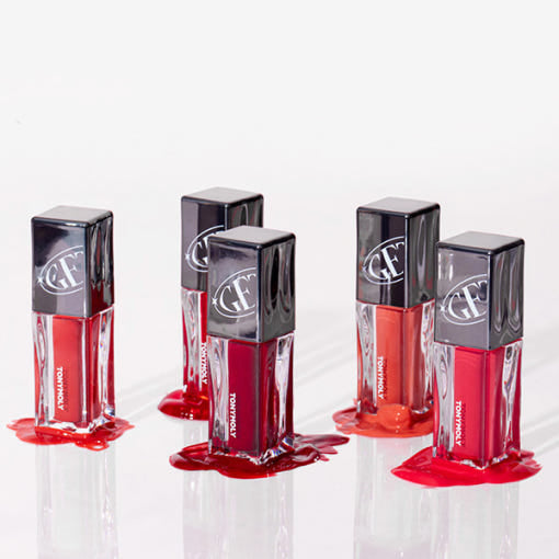 ProtoClinical k-beauty TONYMOLY Get It Tint Colorful Water 3g (5 Colors) single upright red lip tint bottle with a dark cap, centered on a pale pink studio background