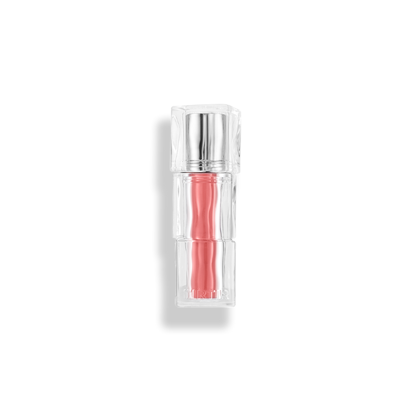 ProtoClinical k-beauty TIRTIR WATERISM Glow Mini Tint 1.8g (30color) single mini lip tint package centered in a square studio shot on a white background