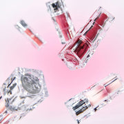 ProtoClinical k-beauty TIRTIR WATERISM Glow Mini Tint 1.8g (30color) single mini lip tint package centered in a square studio shot on a white background