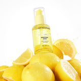 ProtoClinical k-beauty soft yellow beauty detail with pale blue side gradients on a light background.