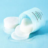ProtoClinical k-beauty white skincare product on a soft aqua background.