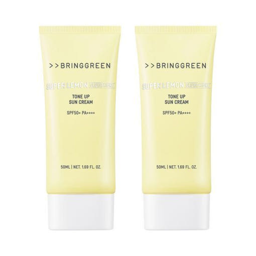 ProtoClinical k-beauty two tall beige cosmetic bottles on a light background.
