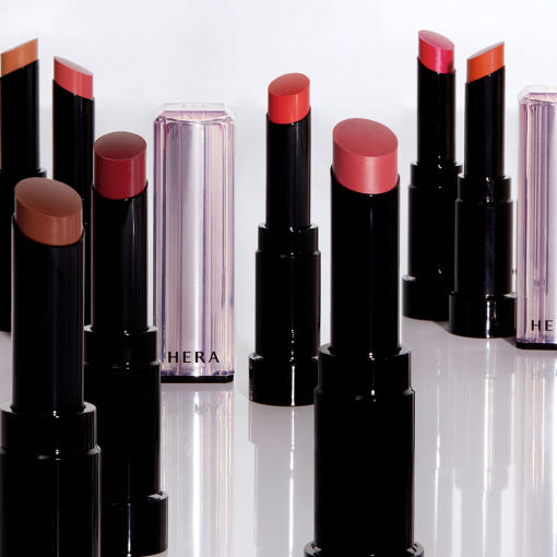 ProtoClinical k-beauty HERA SENSUAL TINTED SHINE STICK 3.5g (9colors) two dark lip product silhouettes on a light background.