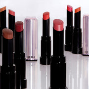 ProtoClinical k-beauty HERA SENSUAL TINTED SHINE STICK 3.5g (9colors) two dark lip product silhouettes on a light background.