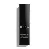 ProtoClinical k-beauty HERA HEALTHY GLOW DEWY BALM 10g slim dark balm silhouette with pale side accents on a light background.