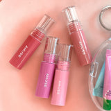 ProtoClinical k-beauty AMUSE Mini Gel Fit Tint Set 1.3g X 4ea single coral lip tint package centered on a soft beige background