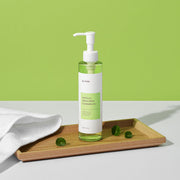 ProtoClinical k-beauty soft green beauty graphic with muted mauve lower accents on a pale background.