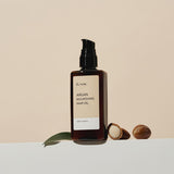 ProtoClinical k-beauty warm beige beauty product silhouette with a soft brown center and pale blue side tones on a light background.