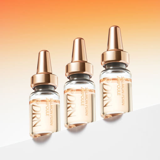 ProtoClinical k-beauty slim pale gray beauty product silhouette with a warm beige top on a light background.